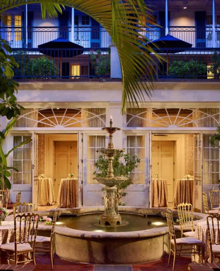 Outdoor event space with picturesque courtyards and lush greenery.