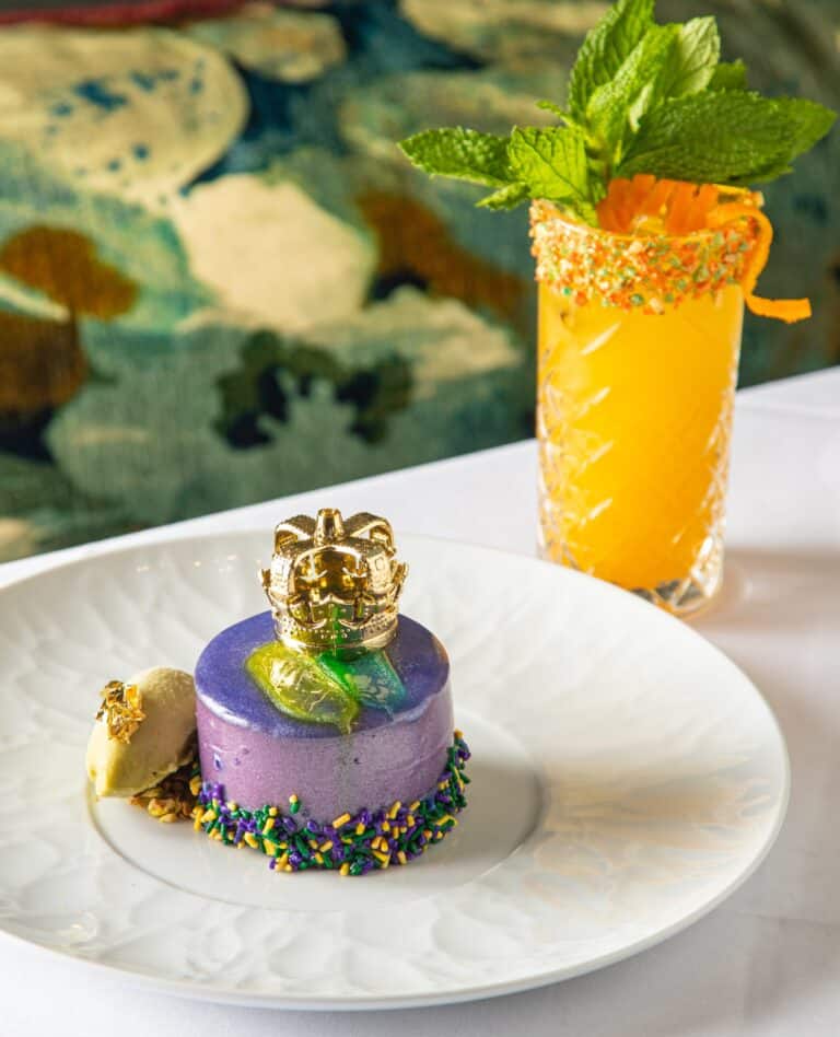 Vibrant cocktail with fresh garnish served in the Royal Sonesta bar.